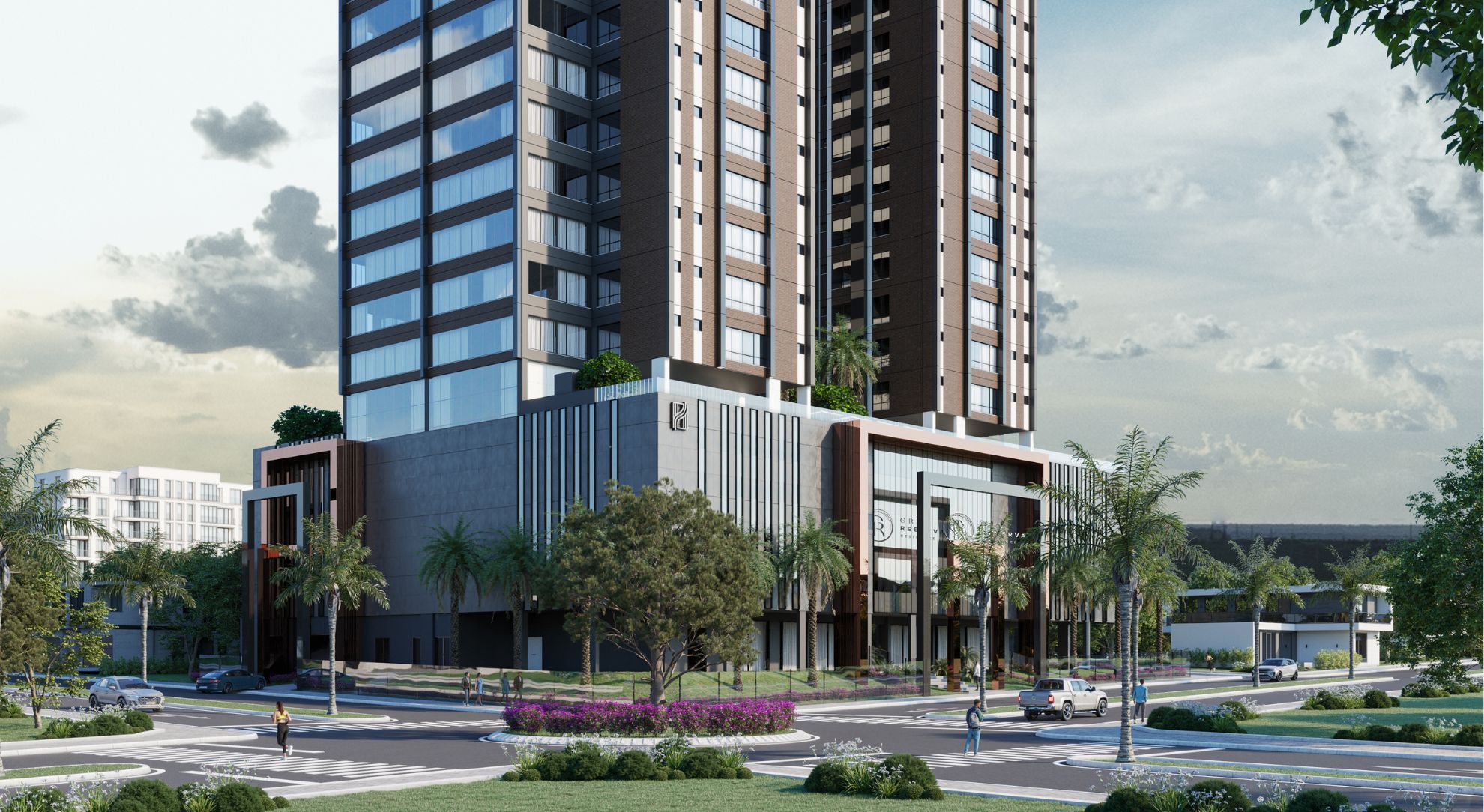 Renderização realista de um empreendimento residencial de alto padrão com duas torres modernas, fachada em tons de marrom e cinza, grandes janelas espelhadas e áreas verdes no topo. A base do edifício apresenta um design contemporâneo com linhas verticais e detalhes em vidro. Em primeiro plano, há uma rotatória com canteiro florido, árvores, palmeiras e pessoas caminhando, transmitindo um ambiente urbano sofisticado e bem planejado.