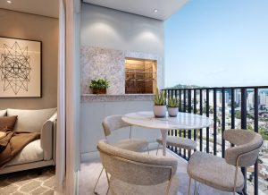 Varanda gourmet moderna com mesa redonda, quatro cadeiras estofadas, churrasqueira embutida e vista urbana ao fundo.